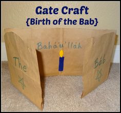 a paper bag with a candle on it and the words gate craft birth of the baby