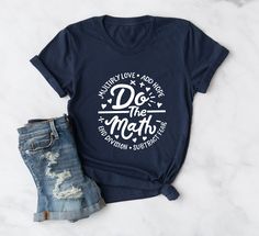 a navy t - shirt with the words do the math on it next to ripped jeans