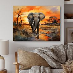 an elephant is walking through the water in front of a sunset painting on a wall