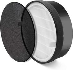 two black and white circular filters on a white background, one is closed to the camera