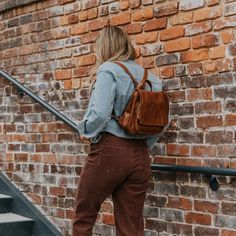 Our leather bags for women bring handmade fashion to practical function — like this beautiful small brown leather backpack purse. The simple vintage style means these backpacks are the perfect minimal classic addition to any outfit. Leather Backed Satchel For Fall Travel, Travel Satchel With Leather Backing For Fall, Versatile Leather Backpack For Everyday, Versatile Leather Satchel Backpack, Leather Backpack For Daily Use In Fall, Daily Use Leather Backpack For Fall, Fall Satchel Backpack For Everyday Use, Everyday Leather Backpack For Fall, Leather Backpack With Adjustable Strap For Fall