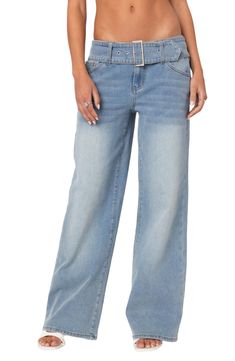 An attached belt with a rectangular buckle adds a stylish element to these retro wide-leg jeans cut from faded stretch denim. Zip fly with button closure Five-pocket style Attached belt 95% cotton, 5% spandex Machine wash, dry flat Imported Visionary Fashion, Wwe T Shirts, Flannel Sweatshirt, Girl Closet, Relaxed Jeans, Swimwear Dress, Jeans Online, Washed Denim, Party Tops