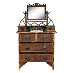 an old wooden dresser with a mirror on it's top and two drawers below