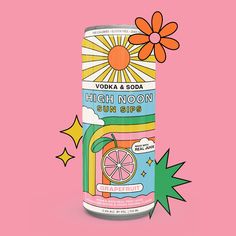 a can of soda on a pink background