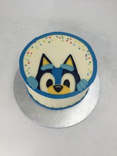 a cake decorated with an image of a cat