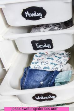 an organized closet with clothes in bins and labels on the bottom shelf for laundry