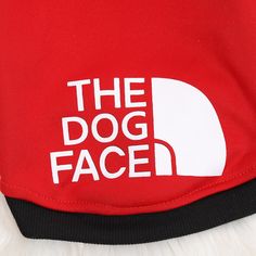 the dog face hoodie is red and white