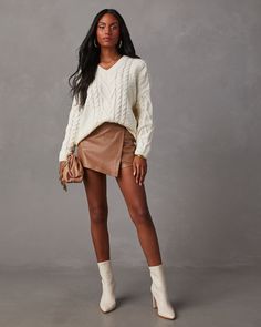 Keep it cute and cozy in the Corey Relaxed Cable Knit Sweater. It features a ribbed V-neckline, hem & cuffs and is made from soft, chunky cable knit fabric. Pair this fall staple with faux leather bottoms or your favorite denim. Relaxed fit V-neckline Long sleeves Ribbed trim Soft, chunky cable knit fabric Runs Large Cozy Cable Knit Sweater For Fall, Cozy Cable Knit Fall Sweater, Fall Chunky Knit V-neck Sweater, Cozy Knit V-neck Sweater For Fall, Cozy Cable Knit V-neck Sweater For Winter, Cozy Knitted V-neck Sweater For Fall, Cozy Long Sleeve Cable Knit V-neck Sweater, Chunky Knit V-neck Sweater For Fall, Chic V-neck Sweater For Fall