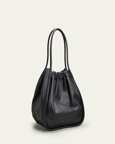 Proenza Schouler smooth twotone leather tote bag. Tubular top handles; ruching at base. Open top with magnetic closure. Interior, contrast leashed zip pouch. 17"H x 26"W x 12"D. Made in Italy. Versatile Black Shoulder Bag With Rolled Handles, Top Handle Hobo Bag With Rolled Handles For Errands, Chic Satchel With Rolled Handles For Errands, Bucket Bag With Rolled Double Handles For Errands, Leather Shoulder Bag With Rolled Handles, Classic Shoulder Bag With Rolled Handles For Errands, Leather Shoulder Bag With Rolled Handles For Errands, The Bag, Zip Pouch