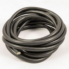 a close up of a black cable on a white background