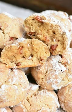 a pile of cookies with peanut butter on top and drizzled in icing