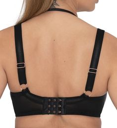 Strap in and show off with this sexy bra style featuring a variety of bands that let you play with its look. Multi-part underwire cup has light padding and vertical seams for a rounded, full, smooth shape. Cup overlay has a leatherette appearance. Sewn-on elastic at front base helps maintain a consistent fit against the body. Strapping harness at front has silky stretch cage bands that frame top of breasts, and have adjustable rose goldtone metal hardware. Harness joins cage bands with a rose go Elegant Black Bra With Removable Straps, Fitted Push-up Bra With Straps, Elegant Party Bra With Removable Straps, Black Party Bra With Removable Pads, Elegant Strappy Bra With Removable Pads, Night Out Underbust Bra With Built-in Support, Fitted Low-cut Bra With Straps, Black Bra With Removable Straps, Black Underwire Bra For Party