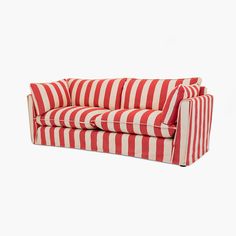 a red and white striped couch on a white background