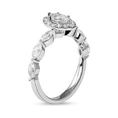 When you propose, present her with this gorgeous diamond engagement ring. Created in cool 10K white gold, this design showcases a 1/3 ct. marquise-cut diamond sparkling in a halo of round diamonds. Shimmering 1/10 ct. marquise-cut diamonds line the shank. Radiant with 1 ct. t.w. of diamonds and a brilliant buffed luster, this engagement ring makes the moment magical. White Gold Marquise Cut Diamond Ring For Proposal, Marquise Cut White Gold Diamond Ring For Proposal, Marquise Brilliant Cut Proposal Ring, Marquise Cut Diamond Wedding Ring With Halo Setting, Marquise Cut With Halo Setting For Wedding Proposal, Marquise Cut Diamond Accent Ring For Proposal, White Halo Ring With Marquise Brilliant Cut, Marquise Diamond Ring With Halo Setting For Anniversary, Marquise Diamond Halo Ring For Anniversary