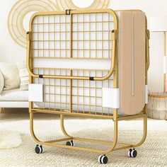 an ironing board on wheels in front of a white couch with a gold frame