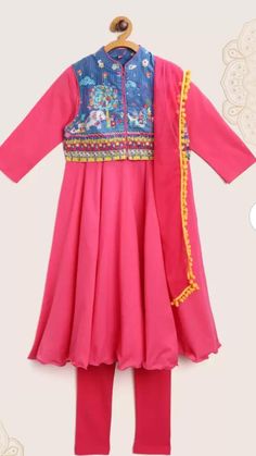 KIDS (Girls) Pink Cotton Anarkali Suit - Size 7 years Pink Anarkali suit set for your little fashionista. The set includes a kurta, churidar bottom, printed jacket in blue color. The base fabric of this set is cotton, which makes it an apt choice for your kid. This piece also includes a round neckline and 3/4th sleeves along with a woven pattern on the jacket. Chanderi Sharara For Festivals, Pink Cotton Anarkali Set With Mirror Work, Pink Salwar Kameez For Diwali, Bollywood Cotton Anarkali Set For Party, Festive Cotton Lehenga With Dabka Work, Festive Pink Choli With Dabka Detailing, Festive Pink Choli With Dabka, Festive Pink Dabka Choli, Pink Cotton Anarkali Choli