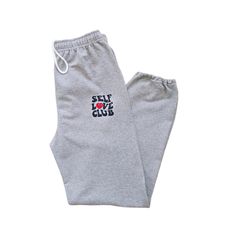 🛒Our unisex retro Self Love Club Sweatpants are a great addition to your closet. The preppy jogging pants are stylish and fashionable, perfect for any outfit. The elastic drawstring waistband will ensure that they fit perfectly, while the comfort and style make them an absolute necessity. 📦 FREE SHIPPING on orders $35 or more to US shoppers 👕Brand = Gildan 🧵Fabric = 50% Cotton / 50% Polyester ✂️Design = Black & Red heat-applied vinyl 🎨Color = Sports Grey (Colors will vary from computer to c Retro Letter Print Bottoms For Streetwear, Retro Bottoms With Letter Print For Streetwear, Retro Streetwear Bottoms With Letter Print, Retro Cotton Loungewear Bottoms, Retro Loungewear Pants With Elastic Waistband, Retro Bottoms With Elastic Waistband For Loungewear, Retro Loungewear Bottoms With Elastic Waistband, Retro Relaxed Fit Loungewear Bottoms, Retro Relaxed Loungewear Bottoms