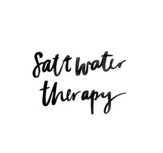 the words salt water therapy written in black ink