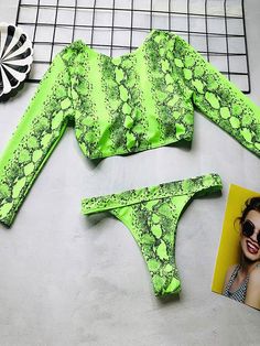 Sku CY-!29312 Material Chinlon Style Bralette , Padded Feature Neon Occasion Beach , Hot Springs , Swimming Pool Type Bikini Swimsuit Color FLUORESCENT GREEN Size S,M,L Size chart: Please consult the size chart we provide for this item's measurements to help you decide which size to buy. Please note: There may be 1-3cm differ due to manual measurement. CMINCH Cm Cup Bust Waist Hips S A-B 70-80 66-76 86-91 M B-C 74-85 70-80 91-96 L C-D/E 78-90 74-84 96-101 Green Long Sleeve Swimwear For Beach, Green Long Sleeve Beachwear Swimwear, Green Tankini For Swimming, Green Long Sleeve Swimwear For Poolside, Green Tankini Beachwear For Pool, Fitted Long Sleeve Green Swimwear, Green Summer Tankini For Party, Green Summer Party Tankini, Green Beachwear Tankini