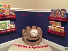 there is a baseball in the mitt and bookshelves on the wall behind it