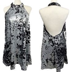 Nwt Tobi Reverse Sequin Halter Mini Swing Dress Sexy, Black Silver - Size S **Note: The Model Photo Is Of The Same Dress In A Different Color Way, Use For Style And Fit Reference. Condition: Excellent Condition! Nwt! No Known Flaws! See All Pictures For Any Signs Of Wear, As They Are Part Of The Description. Size: S Measurements (All Approximate And Taken Flat): Pit To Pit: 16.5" Length: 35" Features: - Black And Silver Color - Sequins - Halter Style - Mini Length - Swing Style Body - Low Back - Silver Backless Sequin Dress For Summer, Silver Sequin Mini Dress For Club, Silver Mini Sequin Dress For Club, Silver Mini Length Sequin Dress For Club, Silver Backless Mini Dress For Night Out, Silver Backless Mini Dress For Date Night, Silver Backless Mini Dress, Silver Backless Dress For Party Season, Silver Backless Dresses For Party Season