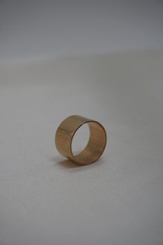 This simple yet bold ring is stunning on its own or layered. The cigar style is classic and timeless. Materials: 14k Gold Fill, Sterling Silver Measurements: This band measures 12 mm wide Timeless 14k Gold Wide Band Ring With Open Band, Timeless 14k Gold Wide Band Ring With Open Design, Timeless Wide Band 14k Gold Open Ring, Timeless Wide Band Open Ring In 14k Gold, Classic Open 14k Gold Wide Band Ring, Classic Dome Ring With Wide Band For Promises, Classic Wide Band Dome Ring For Promise, Minimalist Wide Band With Polished Finish, Classic Wide Band Ring For Promise