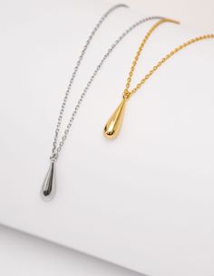 "INDRA" our minimalist water drop, teardrop gold pendant necklace. These lightweight gold necklace feature a simple style pendant with an abstract single water/teardrop droplet. These are made with 925 sterling silver throughout, coated with a layer of 18k gold or rhodium (silver colour), so easy to wear for an effortless everyday look! The necklace chain measures approximately 45.5CM in total (40.5 + 5CM extension). AS PICTURED: Taylor is stacking our INDRA teardrop necklace with our DAMLA drop Minimalist Everyday Dangle Drop Necklace, Minimalist Teardrop Pendant Drop Earrings For Everyday, Dainty Teardrop Pendant Drop Necklace For Everyday, Minimalist Teardrop Pendant Drop For Everyday, Minimalist Teardrop Pendant Drop Gift, Minimalist Teardrop Pendant As A Gift, Minimalist Teardrop Pendant For Everyday, Minimalist Teardrop Pendant For Gift, Hypoallergenic Teardrop Pendant For Everyday Wear