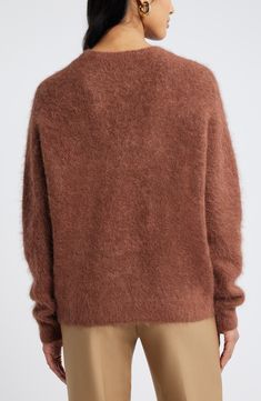 A fuzzy texture turns up the cozy quotient for an endlessly wearable crewneck sweater. Crewneck Long sleeves 55% alpaca, 43% nylon, 2% spandex Hand wash, dry flat Imported Fine Knit Mohair Sweater For Fall, Mohair Sweater With Soft Knit And Crew Neck, Cozy Brown Fine Knit Sweater, Cozy Stretch Brown Sweater, Soft Knit Mohair Crew Neck Sweater, Soft Texture Mohair Crew Neck Sweater, Soft Mohair Crew Neck Sweater, Brown Solid Color Crew Neck Sweater, Mohair Crew Neck Soft Knit Sweater