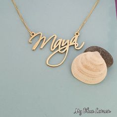 Order any name for your solid 14K gold Maya style nameplate necklace!! A great personalized custom made gift for any occasion!! Birthday, Graduation Or Any Holiday! *Both the nameplate and chain are all solid 14k gold. *Stamped for authenticity 14K. *Nameplate is 0.8 mm high quality thickness. *1.0 cm tall first capital letter. *This listing is for one (1) name with one (1) capital letter only! *In the photo you can view the 1.0 gram box chain. *Choose your twisted herringbone chain length from Elegant Customizable Gold Plated Name Necklace, Custom Name Gold Plated Necklace For Anniversary, Gold Plated Nameplate Necklace For Anniversary, Customized Yellow Gold Sterling Silver Name Necklace, Personalized Name Gold Plated Necklaces, Customizable Gold Plated Yellow Gold Name Necklace, Custom Name Gold Plated Necklace As Personalized Gift, Custom Name Gold Plated Necklace For Personalized Gift, Custom Name Gold Plated Necklaces For Personalized Gifts