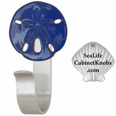 an image of a blue sand dollar on a metal hook with the sealife cabinet knobs com logo below it