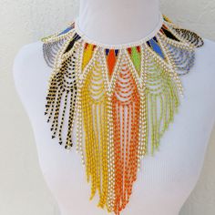 Tribal Beaded Necklace Unique Multicolor Jewelry With Beaded Fringe, Adjustable Beaded Fringe Necklace, Elegant Multicolor Beaded Choker, Elegant Multicolor Beaded Chain Choker, Elegant Multicolor Beaded Fringe Jewelry, Elegant Multicolor Jewelry With Beaded Fringe, Multicolor Beaded Chain Choker For Party, Multicolor Beaded Necklace With Dangling Beads For Party, Multicolor Beaded Festival Costume Necklace