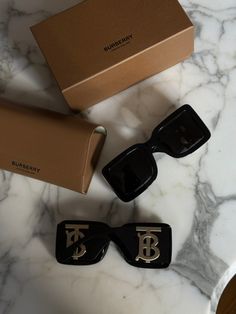 Brand new Burberry B4406U Black Gold Sunglasses. Thick acetate legs with large gold B cutout logos. Size 55-20-140. Arrives with Burberry box, hard case, cloth, carrying cloth pouch and booklet. Made in Italy. Retail price $469. Black Gold Sunglasses, Cloth Pouch, Men's Eyeglasses, Burberry London, Gold Sunglasses, Hard Case, London England, Jimmy Choo, Stella Mccartney