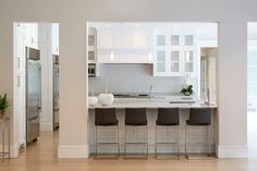 the kitchen is clean and ready to be used as a dining room or office area