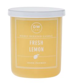 fresh lemon scented candle in a glass jar