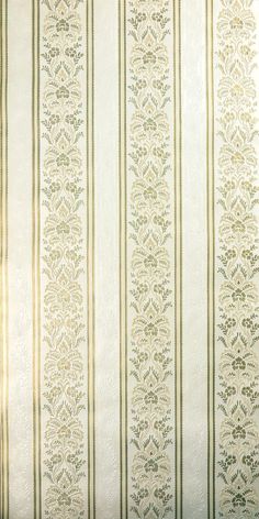 a white and green striped wallpaper with vertical stripes in the center is an ornate design