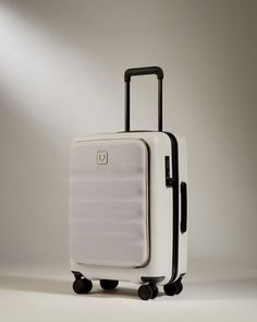 Say hello to effortless travel with the Icon Stripe Pocket. Our iconic carry-on suitcase features a sleek yet practical front pocket that accommodates tech and other essentials without compromising the interior capacity of the suitcase. The hardwearing polycarbonate shell ensures your belongings stay protected, whether you're winding through airports or storing your case in the overhead luggage rack. The color matched front pocket is more than just an aesthetic feature; with a front opening desi Pink Luggage Sets, Suitcase Sets, Underseat Carry On, Pink Suitcase, Hard Suitcase, Pink Luggage, Hard Shell Luggage, Cabin Suitcase, Hardside Luggage