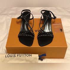 Bnwt Authentic Brand New Louis Vuitton Citizen Sandals, Black And White Logo On The Straps Size 40. Comes With Extra Heels Caps, Dust Bags And The Lv Box. Luxury Black Low Heel Sandals, Designer Black Low Heel Sandals, Designer Black Sandals With Low Heel, Extra Heels, Black And White Logo, Black And White Logos, Heel Caps, Louis Vuitton Shoes, Sandals Black