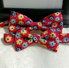 "Floral Matching Bow Tie Set is a Custom Bow Tie and Fully lined handmade. The Bow Ties are great gifts and make for beautiful holiday pictures and outfits. This Bow Ties are perfect for your little one to wear and match his daddy on that special event or for that special family picture. Please Note: The price is $28.99 for the set of Bow Ties. Please select sizes when ordering. Bow Ties are made out of 100% Cotton Fabric Fully lined and they measure approximately: Men's 5\" by 21/2\" Tall and a Red Tie As A Summer Gift, Multicolor Bow Tie For Summer Gift, Red Bow Tie Back Bow As Gift, Red Bow With Bow Tie Back For Gift, Fitted Multicolor Bow Tie For Gift, Red Bow Tie As A Gift, Red Bow With Tie Back As Gift, Fitted Bow Tie As A Gift, Suit And Tie Accessories With Butterfly Knot For Gifts