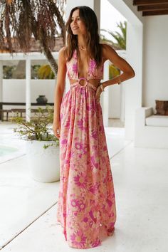 You will be feeling like the main character in the Make It Mine Maxi Dress. Stand out from the crowd and style yours with neutral block heels and gold adornments for your next day out in the sun. Floaty maxi dress. true to size Plunge neckline with halter tie O-ring detail to centre Floral print throughout Waist tie details Elasticised waist Split to left side Style slips on Not lined Light weight. textured rayon Non stretchy material Cold hand wash only Model wears XS Spring Beach Cover-up Maxi Dress, Spring Beach Maxi Dress Cover-up, Pink Halter Neck Maxi Dress For Summer, Chic Backless Maxi Dress For Vacation, Beach Halter Neck Dress With Cutout, Summer Halter Neck Dress With Cutout, Spring Party Beach Dress In Maxi Length, Cutout Sundress Maxi Dress, Spring Party Beach Dress Maxi Length