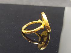 ARTSMYRNA METAL: 925k Silver GEM: Bronze Replica Coin COATING: 24k gold over (We can made a special type of coating for your personal preference ) MATERIEL : 925K Sterling Silver ( Some of my items vermeil gold over silver for looks rich . But i can finish in silver too ) RING SIZE: 6 (your desired size is made) SHIPPING PRICE AND DURATION: We are shipping worlwide. Your products are sent within 2 business days after the order. 1-3 working days to Europe United States 6-10 working days other cou 22k Gold Rings With Bezel Setting, Gold Byzantine Jewelry With Bezel Setting, Gold Byzantine Ring With Bezel Setting, Gold Rings For Jewelry Making With Polished Finish, Gold Byzantine Signet Ring As Gift, Gold Signet Ring With Bezel Setting As Gift, Gold Engraved Ring With Bezel Setting For Gift, Gold Engraved Ring With Bezel Setting As Gift, Gold Byzantine Oval Ring