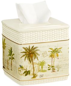 a tissue box with palm trees on it