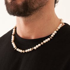 If it's not the real deal, it's not CRAFTD. This pearl necklace showcases 18K Gold ICED spheres and crosses, each embellished with premium AAA hand-set stones. Hand-strung with the finest natural pearls in the game, no two pieces are the same, ensuring a one-of-a-kind addition to your collection. Wear it solo as a statement piece or pair it with the real round pearl necklace for a layered summer look. ✓ Real Freshwater Pearls✓ AAA-Grade Cubic Zirconia✓ 18K Gold & 316L Stainless Steel✓ Water, Hea Luxury Pearl Necklaces With Round Beads, Luxury Pearl Drop Jewelry With Round Beads, Spiritual Single Strand Pearl Necklaces, White Pearl Jewelry With Gemstone Beads, Luxury Beaded Pearl White Pearl Necklace, Luxury Pearl White Beaded Pearl Necklace, Spiritual Pearl Chain Jewelry With Round Beads, Luxury White Necklaces With Polished Beads, Luxury White Necklace With Polished Beads