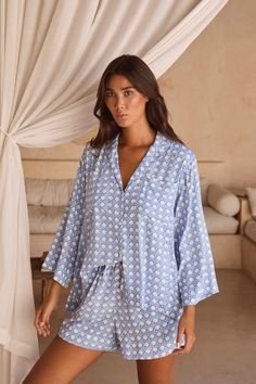 Description The Peta Pajama Sleep Set is irresistibly comfortable, crafted from our signature soft rayon. Features a boxy-cut top with bust pockets and buttons. Very relaxed style fit Boxy shaped button-up collared top with bust pockets High-waisted shorts with elastic drawstring and side pockets Pre-washed 100% Rayon, super soft feel Sizing Stella is wearing a size S/M, and is an Australian 8-10, US size 4-6, approx 5'11 tall. Very relaxed style fit. The following guidelines can be applied to s Resort Wear Men, Bridesmaid Pjs, Sleepwear Women Pajamas, Collared Top, Mens Sleepwear, Floral Pajamas, Cut Top, Arts District, Sleep And Loungewear