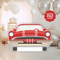 a red car is parked in front of some white balloons and silver garlands with the words digital file cutout above it