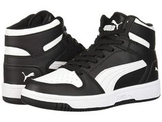 PUMA Kids Puma Kids Rebound Layup Synthetic Leather Sneakers (Big Kid) - Kid's Shoes : Puma Black/Puma White : The Puma Kids Rebound Layup Synthetic Leather sneaker gives off an old-school vibe with its high-top design in a faux-leather upper. Lace-up closure. Brand logo detail at tongue and back. Round-toe construction with perforated detail at vamp. Soft fabric lining. Softfoam sockliner provides comfort and cushioning. Rubber outsole. Imported. Measurements: Heel Height: 1 1 10 in Weight: 10.8 oz Platform Height: 4 5 in Product measurements were taken using size 4 Big Kid, width M. Please note that measurements may vary by size. Casual Puma High-top Sneakers, Casual Puma Basketball Shoes In Synthetic, Puma High-top Synthetic Sneakers, Puma Basketball Shoes With Round Toe, Puma High-top Sneakers With Round Toe For Sports, Puma High-top Sneakers For Sports, Puma High-top Sneakers With Round Toe For Streetwear, Puma Logo High-top Sneakers For Streetwear, Black Puma Lace-up Basketball Shoes