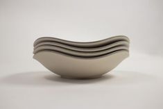 a white bowl sitting on top of a table