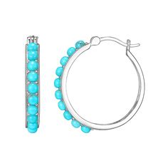 These platinum over sterling silver hoop earrings are adorned with bright simulated turquoise stones that'll put a smile on your face. These platinum over sterling silver hoop earrings are adorned with bright simulated turquoise stones that'll put a smile on your face. Nickel free Metal: sterling silver Backings: click-it Packaging: boxed Plating: platinum Finish: polished Diameter: 1 in.STONE DETAILS Stone type: simulated turquoise Total weight: 2 ct. Shape: round Gemstones may have been treate Nickel-free Turquoise Hoop Jewelry, Turquoise Pierced Hoop Earrings, Turquoise Hoop Jewelry, Turquoise Sterling Silver Round Hoop Earrings, Turquoise Sterling Silver Hoop Earrings For Pierced Ears, Turquoise Sterling Silver Nickel-free Hoop Earrings, Turquoise Sterling Silver Small Hoop Jewelry, Turquoise Sterling Silver Hoop Earrings, Turquoise Sterling Silver Small Hoop Earrings