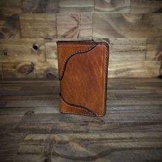 This is my Montana Western vertical wallet. My best seller it is shown in Chestnut and Tan 2 Toned. It measures 3.125 x 4.625 Closed Leather. Being a natural material, the shade of leather will vary with every wallet made. Brown Trifold Card Holder With Smooth Grain, Rectangular Cognac Leather Trifold Wallet, Cognac Leather Rectangular Trifold Wallet, Cognac Leather Trifold Wallet, Brown Trifold Wallet For Daily Use, Brown Trifold Card Holder For Daily Use, Rustic Brown Wallets With Card Slots, Rustic Brown Bifold Wallet, Brown Leather Trifold Wallet