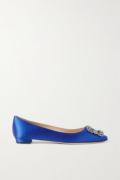 Manolo Blahnik discovered the beautiful crystal-embellished buckle (that's become nothing short of iconic) in Italy, where his designs are also meticulously crafted. These 'Hangisi' flats are made from lustrous royal-blue satin with leather linings and soles. Take a cue from stylist and influencer Emili Sindlev, who likes to match the shade of her Manolo's to her accessories. -- Heel measures approximately 10mm/ 0.5 inches - Royal-blue satin - Slip on - Made in Italy Elegant Crystal Embellished Ballet Flats For Evening, Embellished Elegant Ballet Flats, Elegant Embellished Flat Ballet Flats, Elegant Embellished Ballet Flats, Elegant Embellished Ballet Flats For Formal Occasions, Chic Embellished Ballet Flats, Elegant Embellished Ballet Flats For Party, Embellished Flats With Flat Heel For Formal Occasions, Chic Embellished Closed Toe Flats