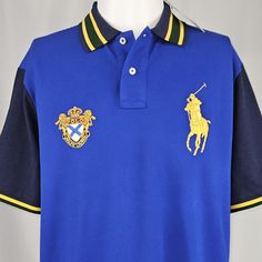 Brand New With Tags! Smoke And Pet Free Home Polo By Ralph Lauren Classic Fit Shirt Short Sleeves With Ribbed Arm Royal Blue With Dark Green And Navy Trim Around Sleeves, Embroidered Metallic Gold Big Pony And Emblem Ribbed Polo Collar. Two-Button Placket. Tennis Tail. Men’s Size Medium 100% Cotton Thanks For Checking It Out! ***I Ship Every Single Business Day!*** Blue Collared Polo Shirt With Placket, Blue Polo Collar Top With Placket, Blue Cotton Polo Shirt With Placket, Blue Polo Shirt With Collar And Placket, Blue Polo Shirt With Collar Placket, Blue Polo Shirt With Polo Collar, Blue Polo Shirt With Collar, Blue Polo Shirt For Workwear, Blue Cotton Shirt With Collared Neckline